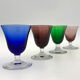 Nine vintage liquor glasses, coloured glass 20th century