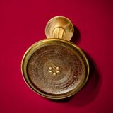 Old brass and chrome-plated metal ashtray on stand