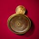 Old brass and chrome-plated metal ashtray on stand