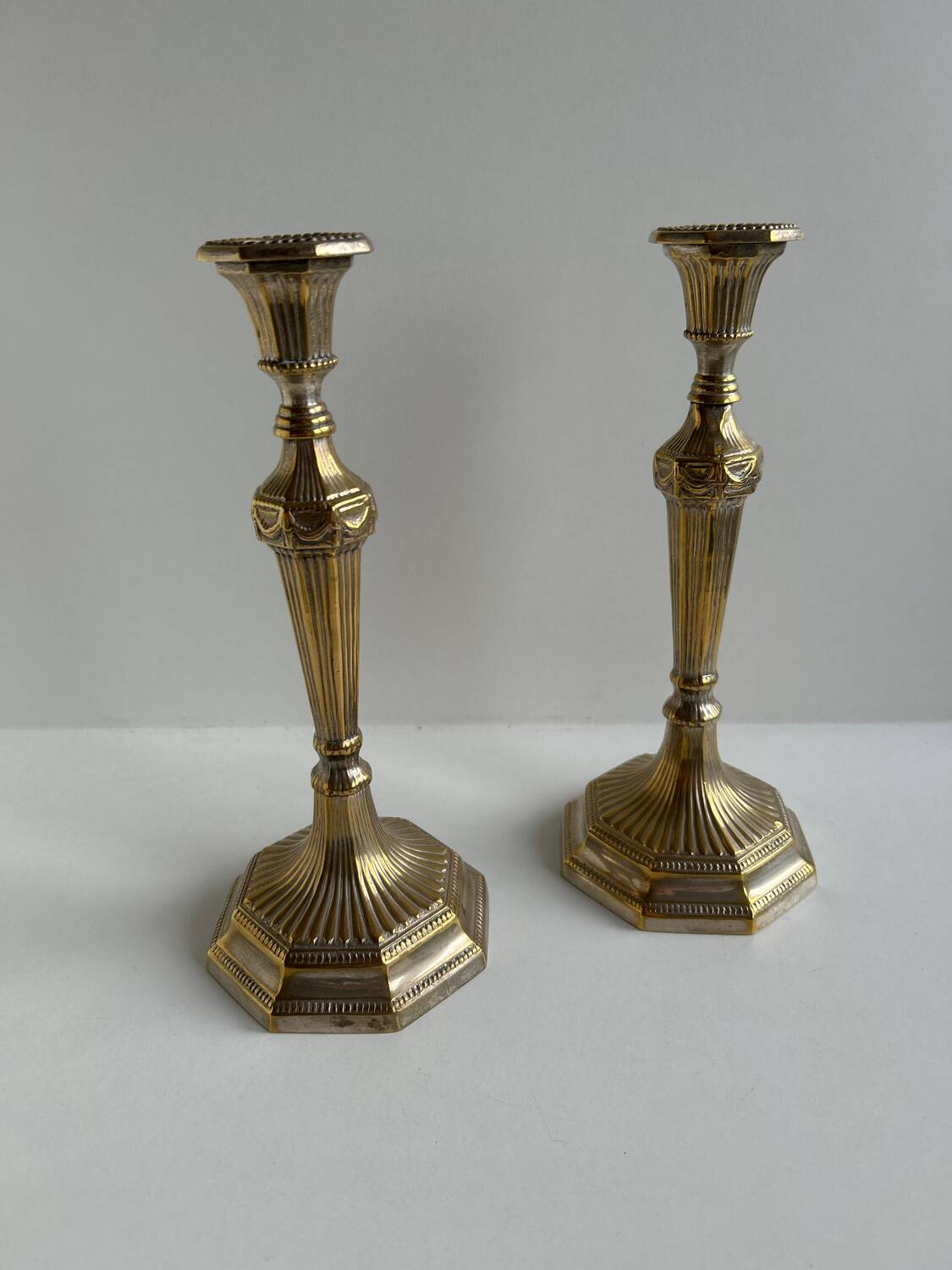 Pair of Louis XVI style candlesticks