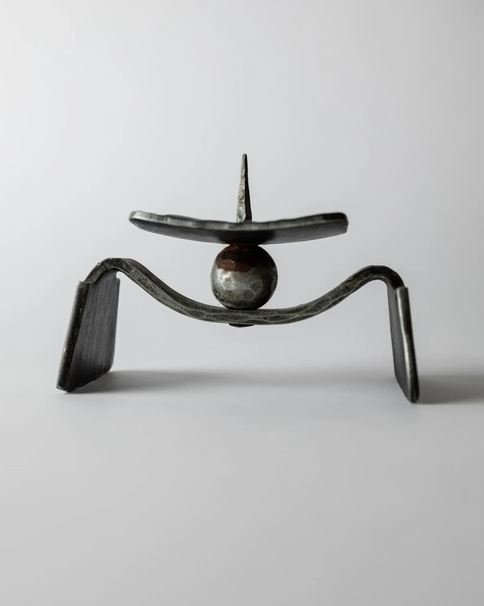 Vintage brutalist iron candlestick from the 1970s.