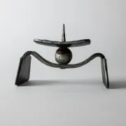 Vintage brutalist iron candlestick from the 1970s.