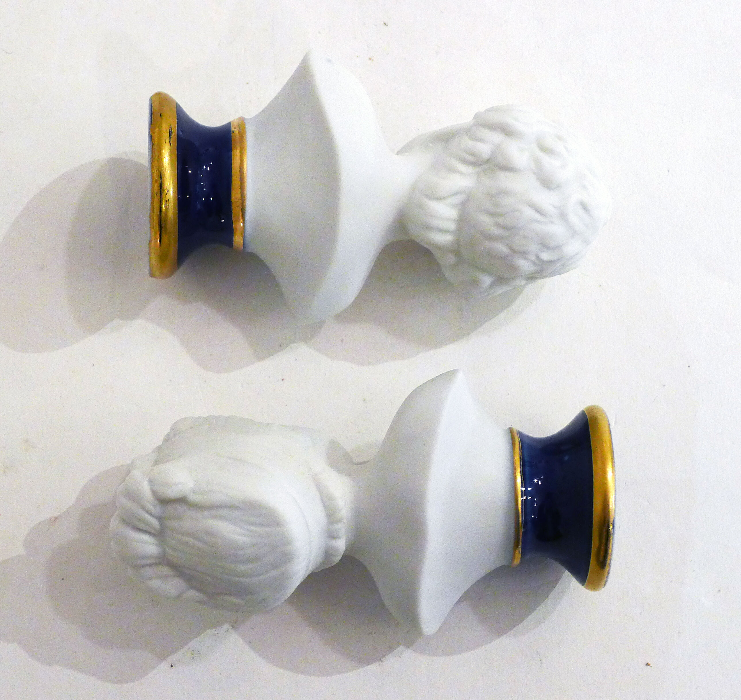 Pair of busts in biscuits