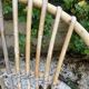Set of 3 vintage rattan armchairs