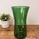 Green blown glass vase with a bubble design