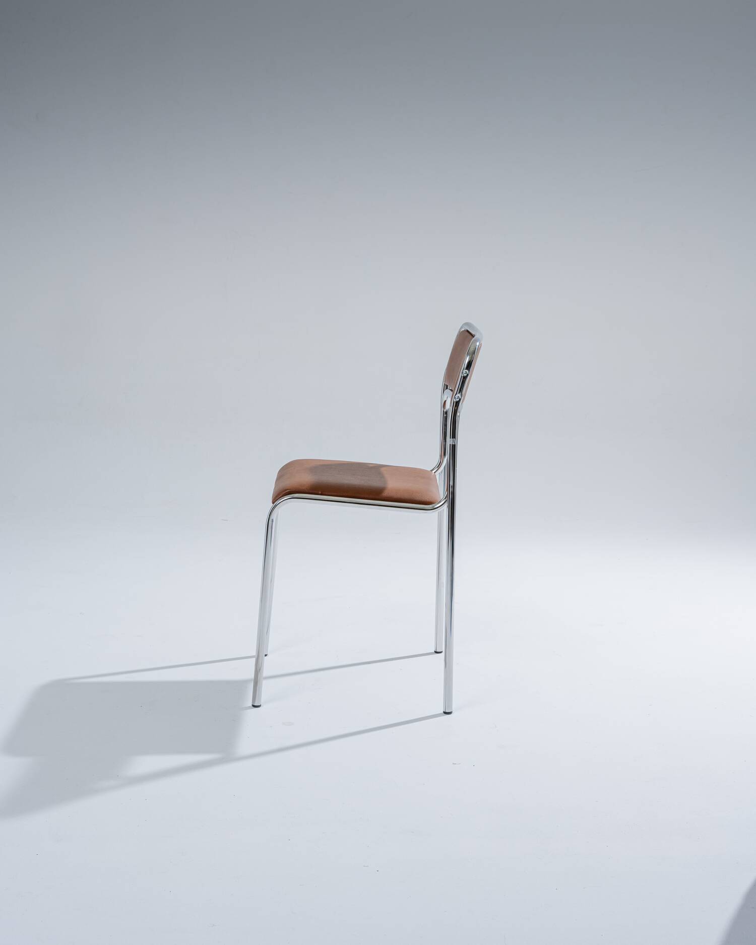 Tubular steel and cognac leatherette chair, 1980s