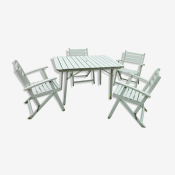 Table et 4 fauteuils blanc en bois marque Dejou