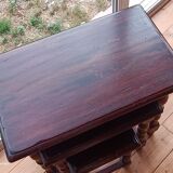 Nesting tables in oak wood. Turned wooden legs.