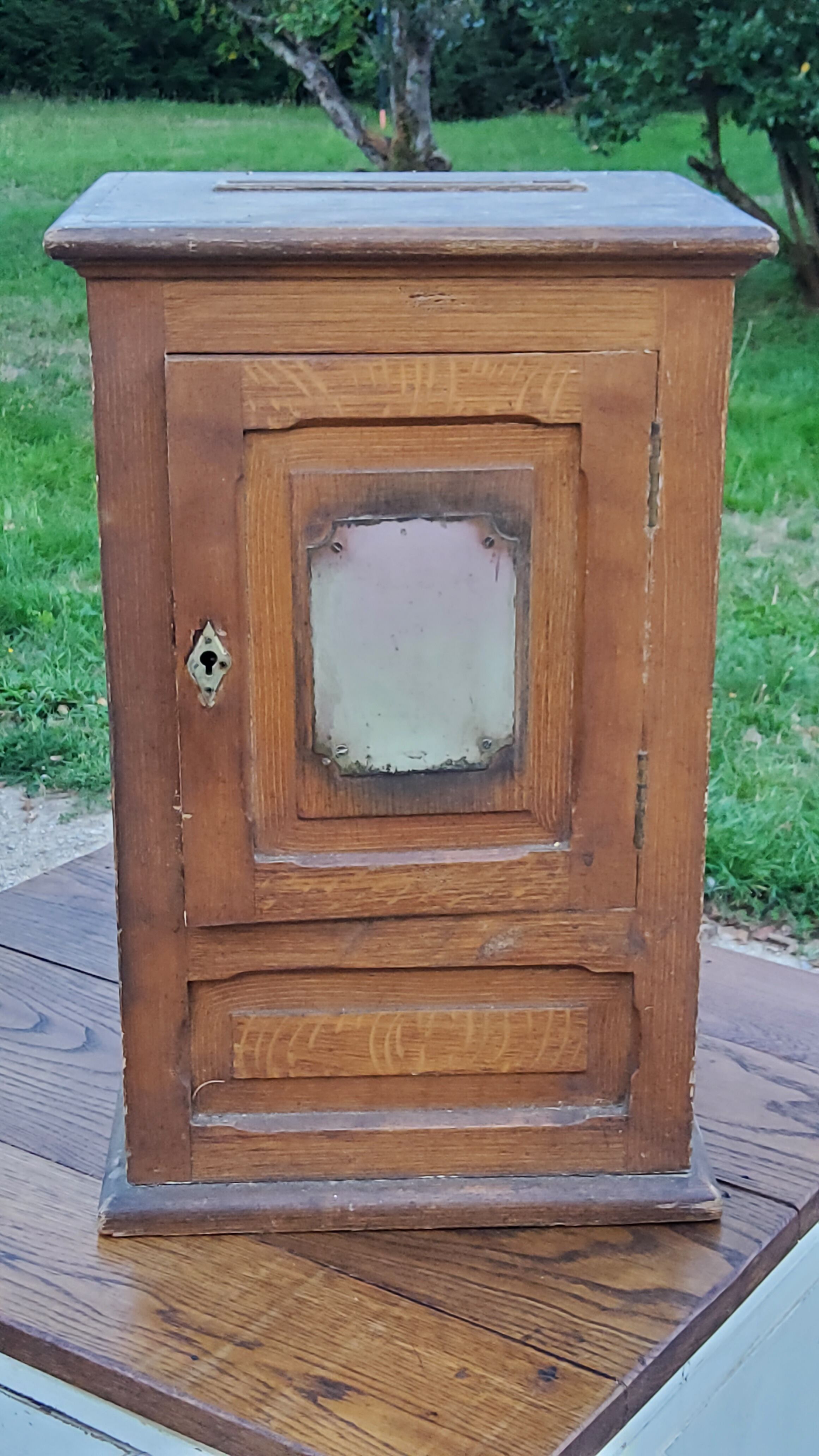 Old oak and brass mailbox