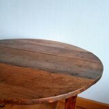Antique round walnut table with flaps