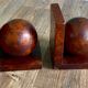 Pair of bookends adorned with spheres