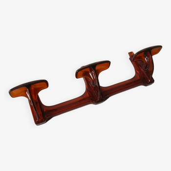 Old coat rack with 3 hooks from the 1970s in amber style plastic, retro decor