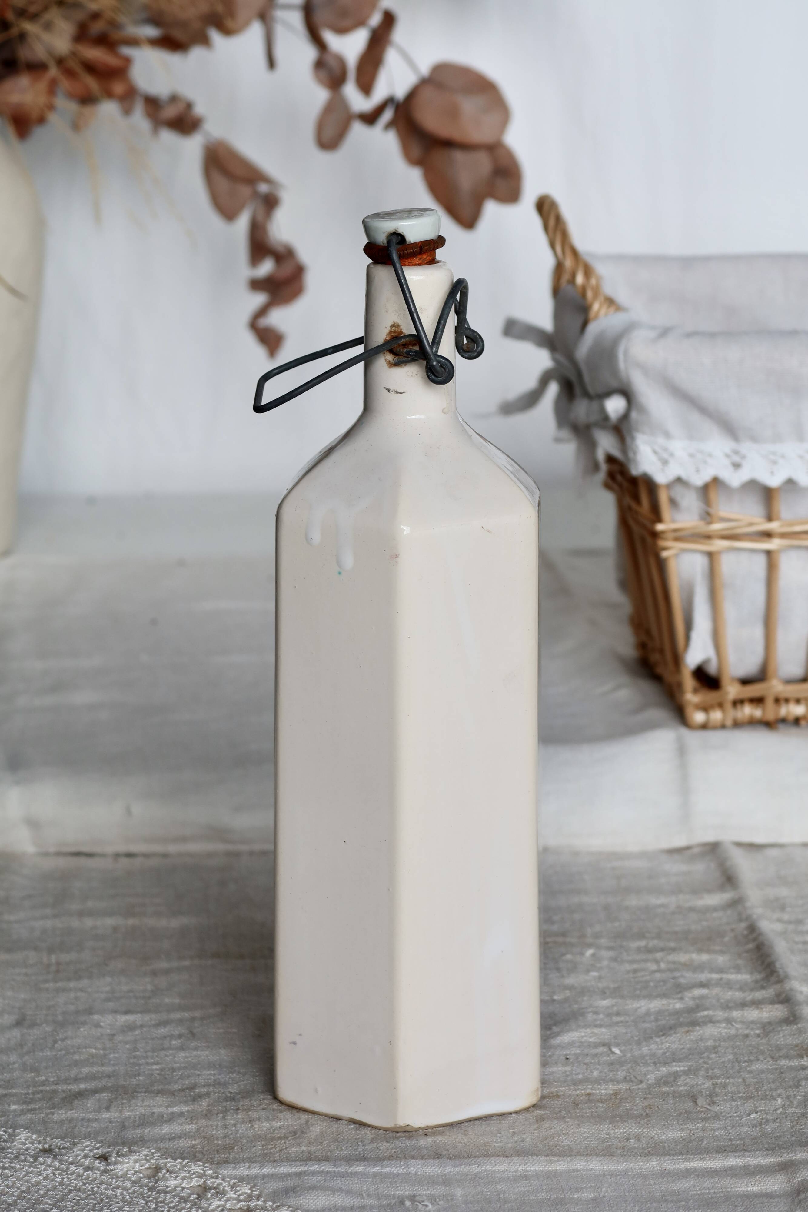 Antique beige glazed ceramic bottle