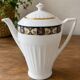 Cafetière / théière ancienne en porcelaine