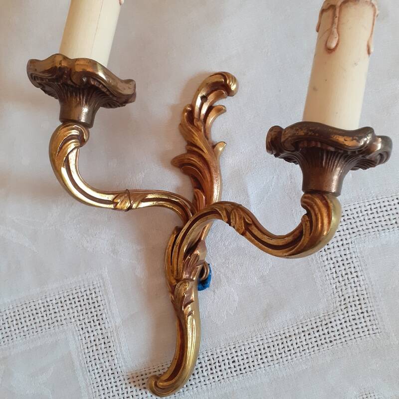 Pair of two-armed wall lights in gilded bronze, Louis XV style, by Lucien Gau.