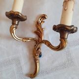 Pair of two-armed wall lights in gilded bronze, Louis XV style, by Lucien Gau.