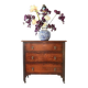 Antique oak chest of drawers on castors with brass handles and carved details