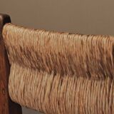 Set of four modernist chairs in oak and straw, France, circa 1960.