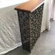 Console cache radiateur