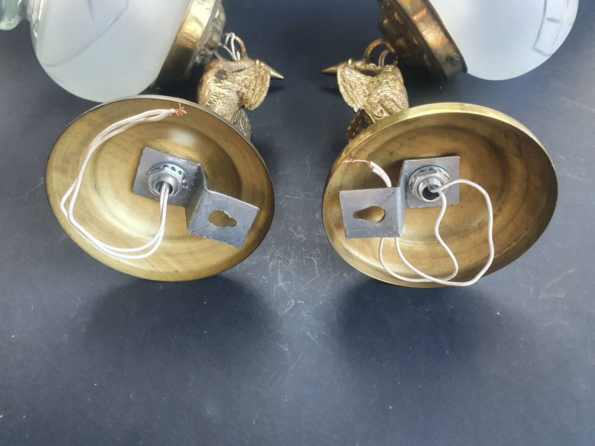 Pair of antique bronze wall sconces