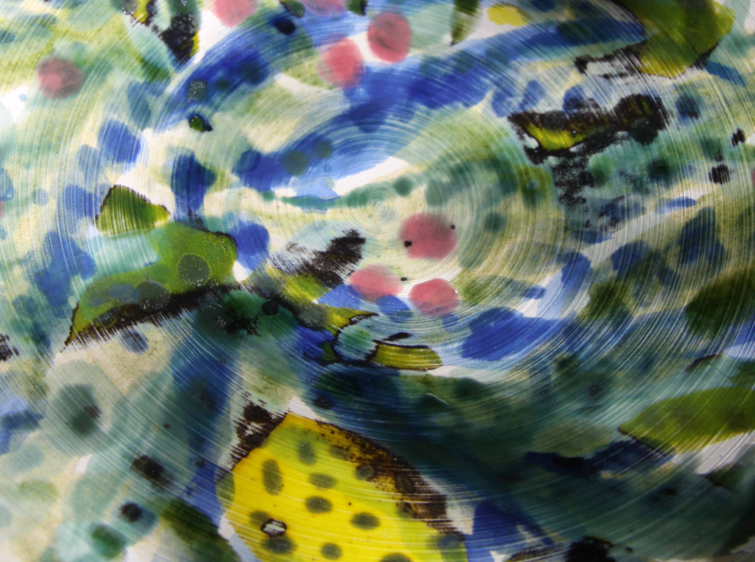 Decorated white earthenware fruit bowl