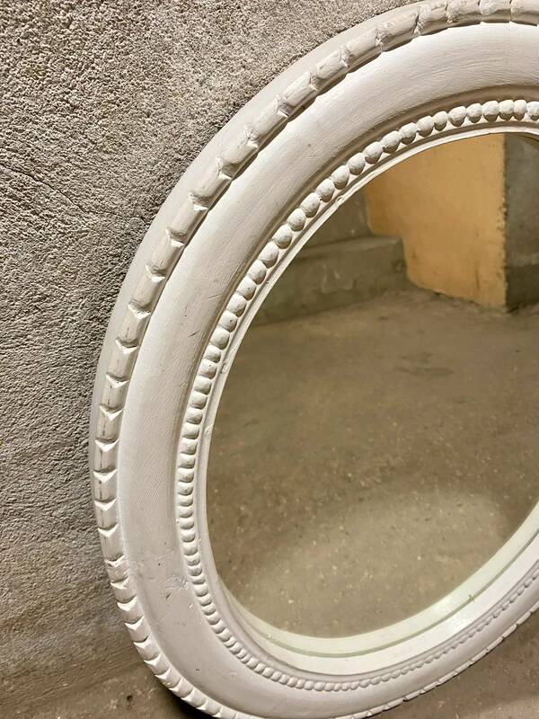 Oval white mirror