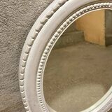 Oval white mirror