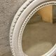 Miroir blanc ovale