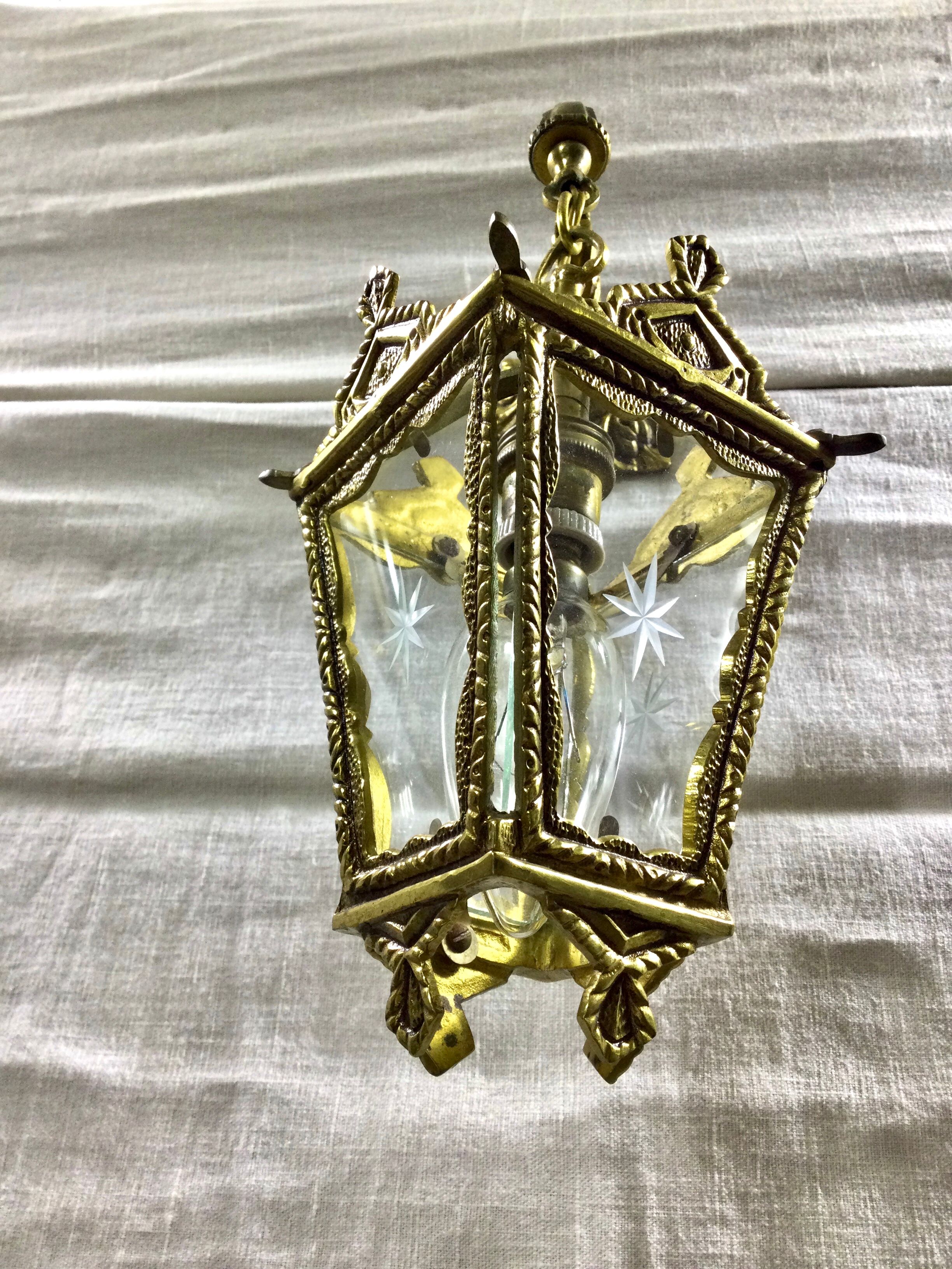 Bronze lantern with starry glasses