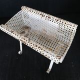 Wrought iron planter hides perforated sheet metal pot