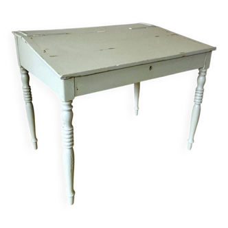 Antique wooden sloped desk, with a drop-down front and turned legs.
