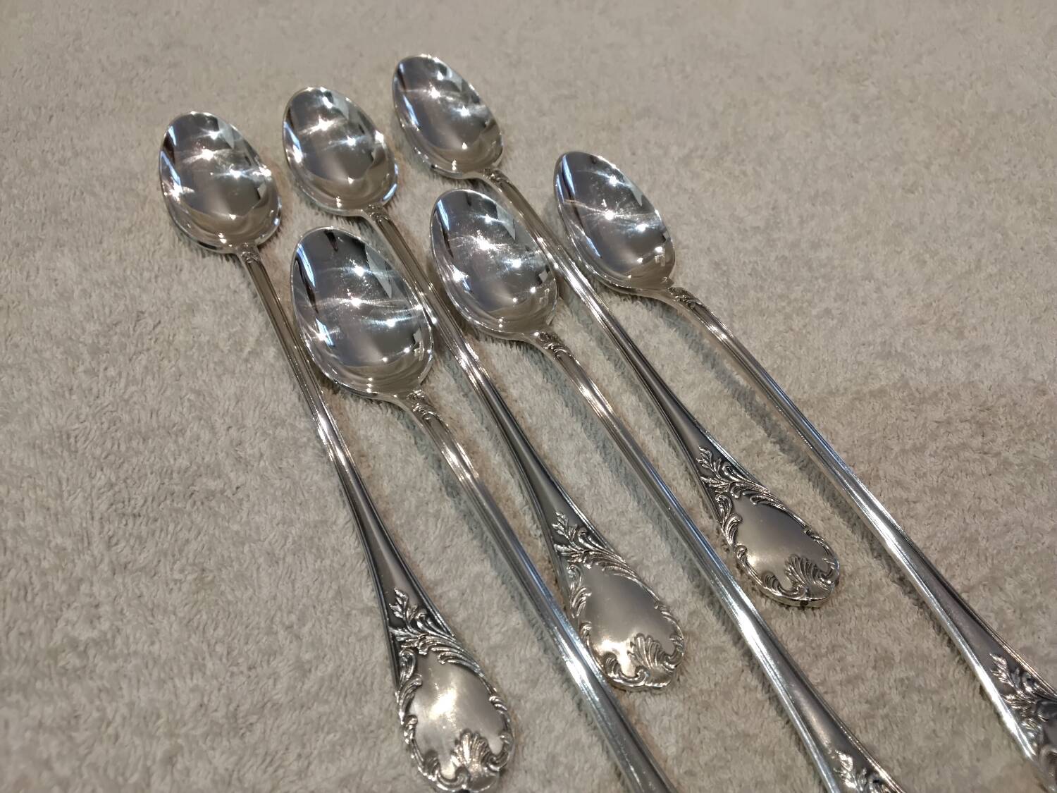 6 silver-plated metal dessert spoons by Christofle Marly, 19.6 cm.