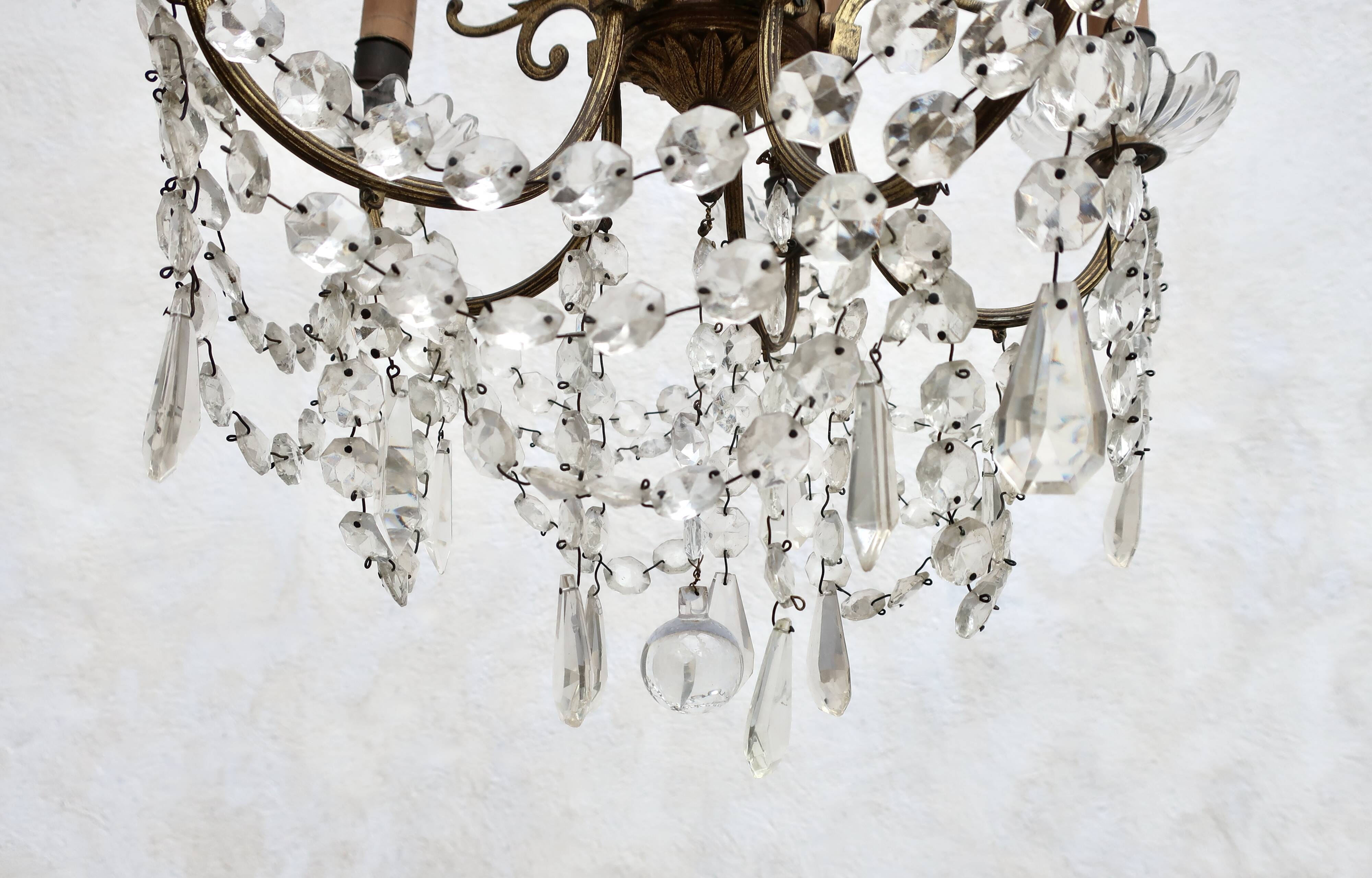 Bronze chandelier with crystal pendants circa 1950, 5 lights, H = 81 cm