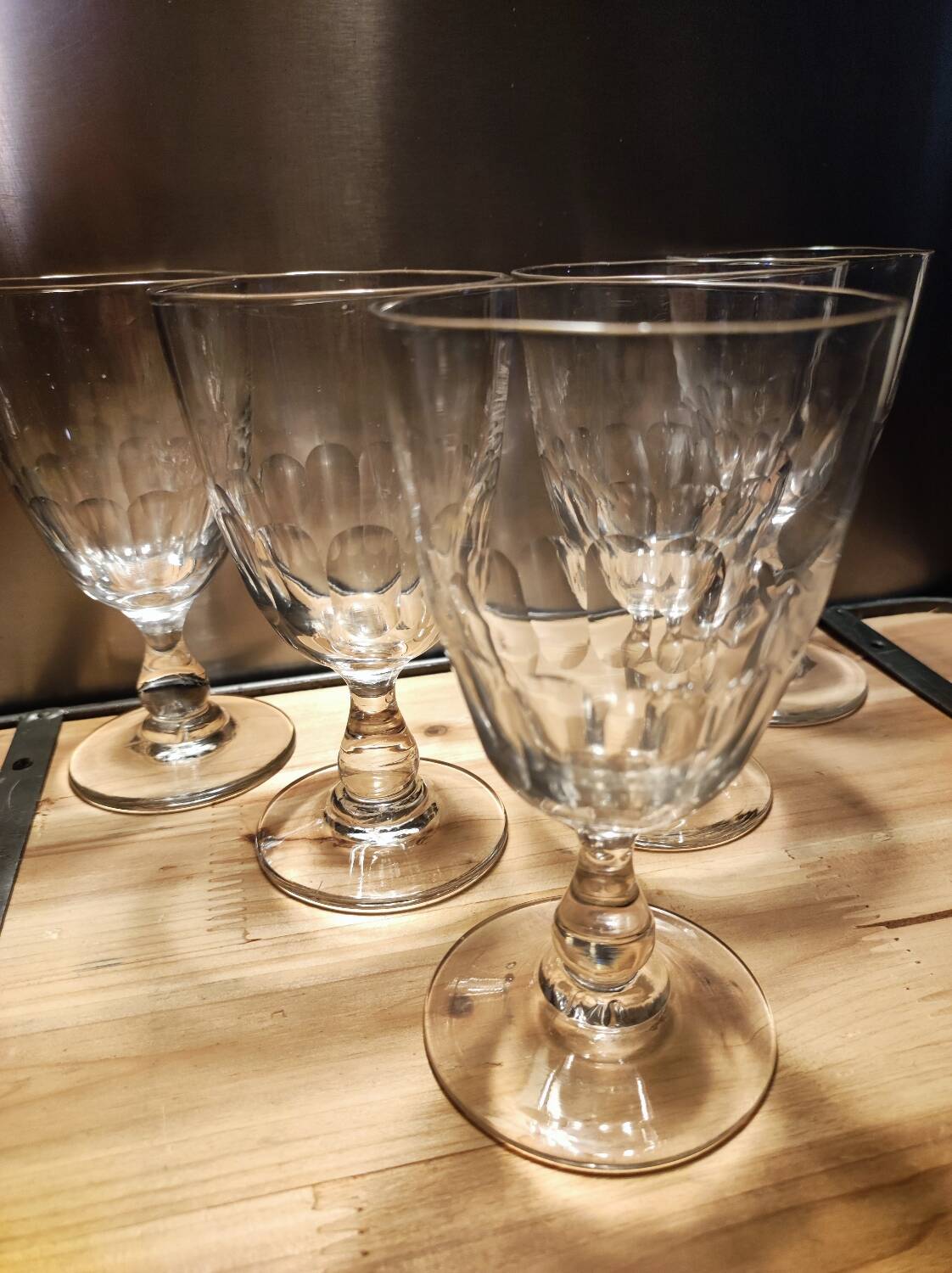 5 antique wine glasses with cut sides