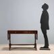 Antique mahogany desk with ebony and maple finishes, United Kingdom, 20th century.