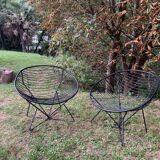 Pair of round chairs in black tubular steel 1960
