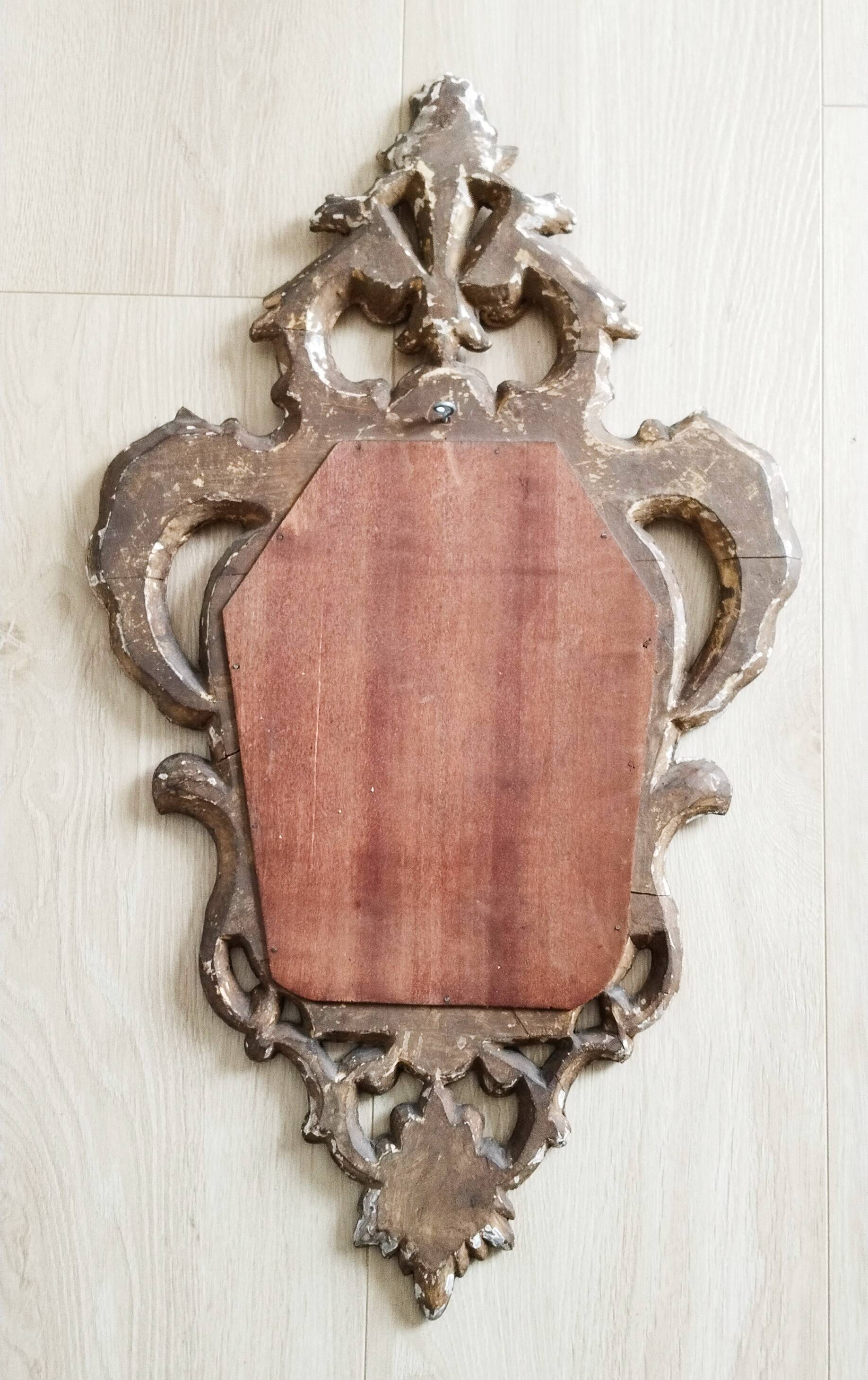 Mirror carved in gilded wood, 19th century
