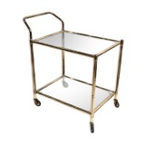 Golden metal dessert with tinted glass tops