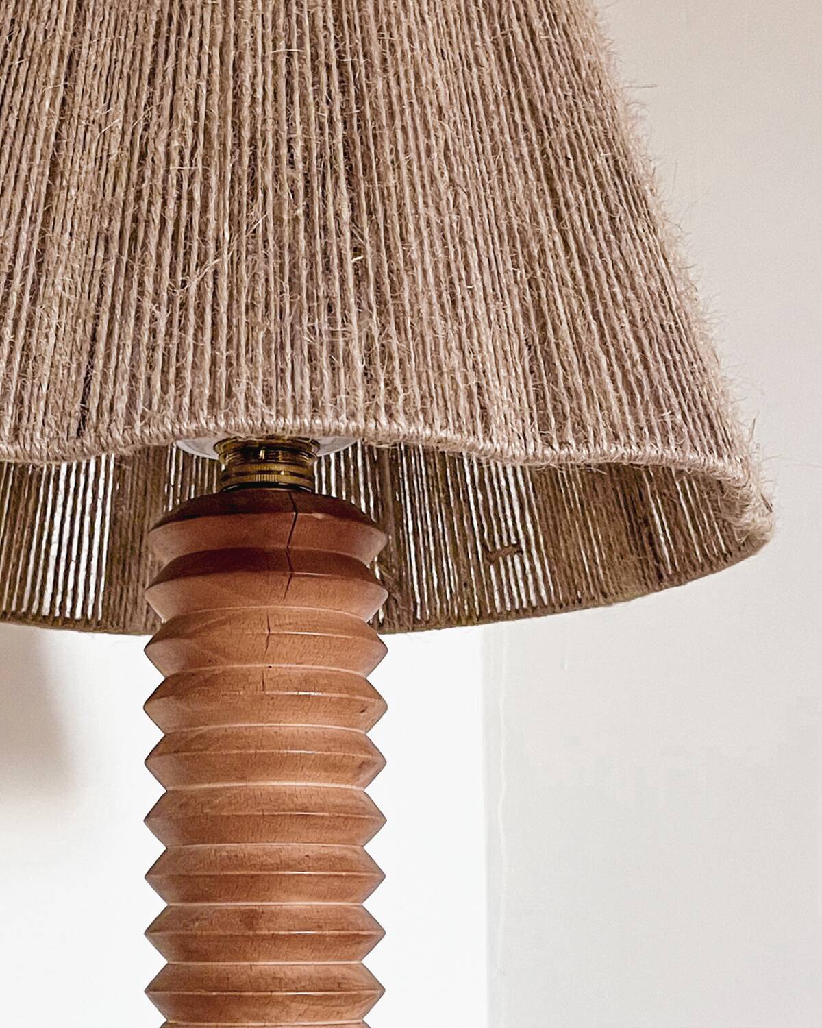 Turned wood lamp and jute lampshade