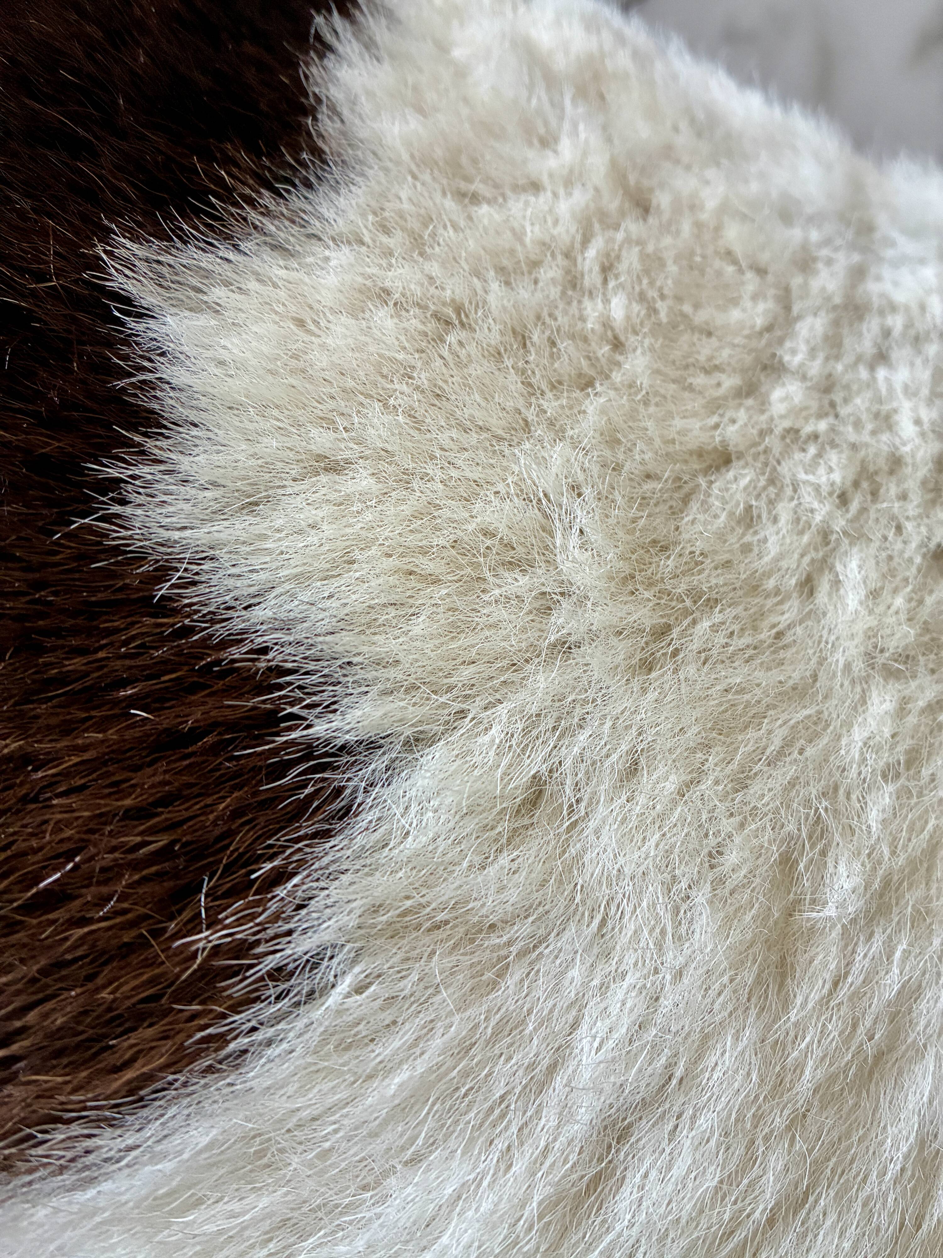 Small tripod stool in cowhide