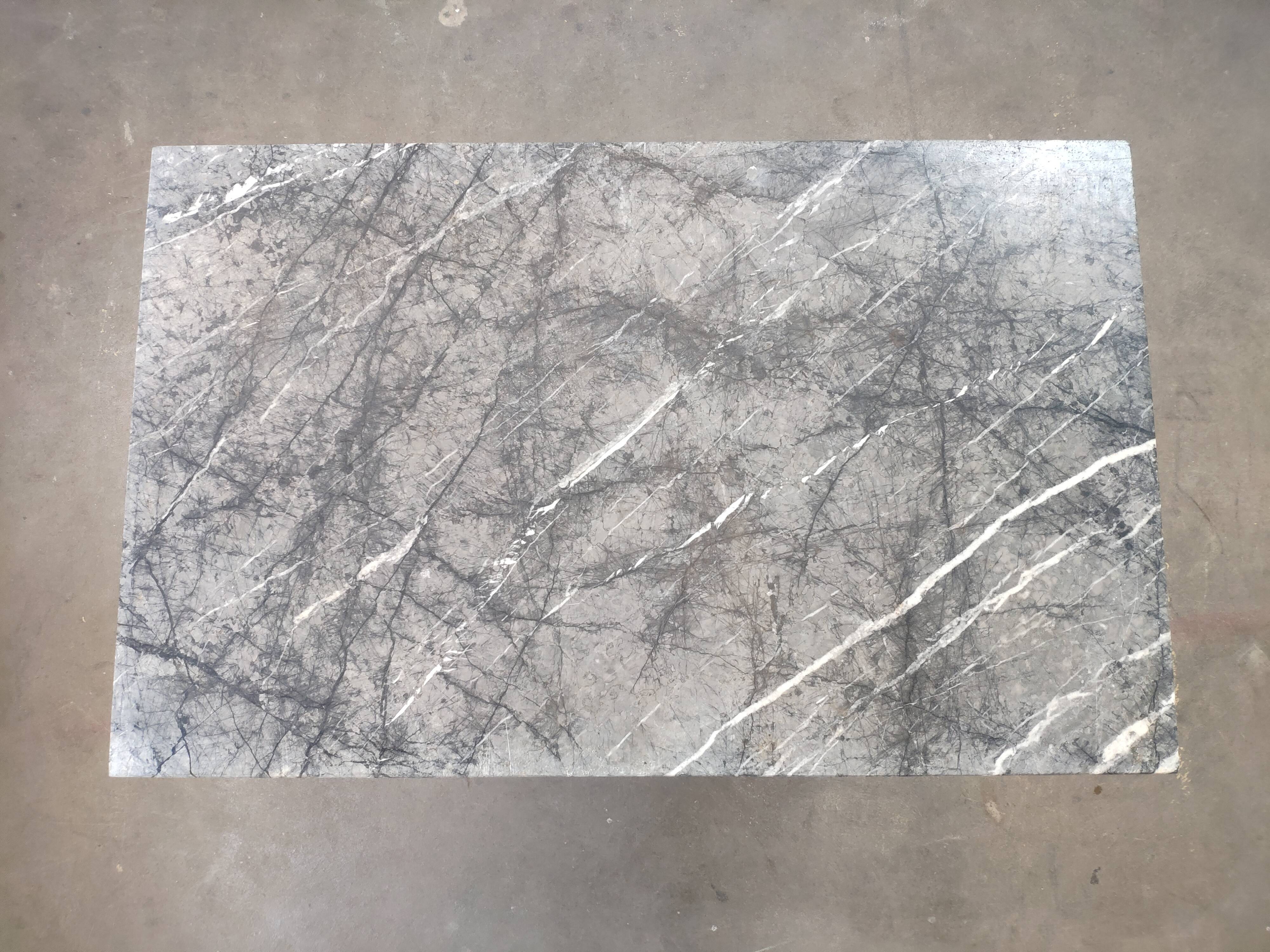 Wrought iron bistro table and vintage grey marble