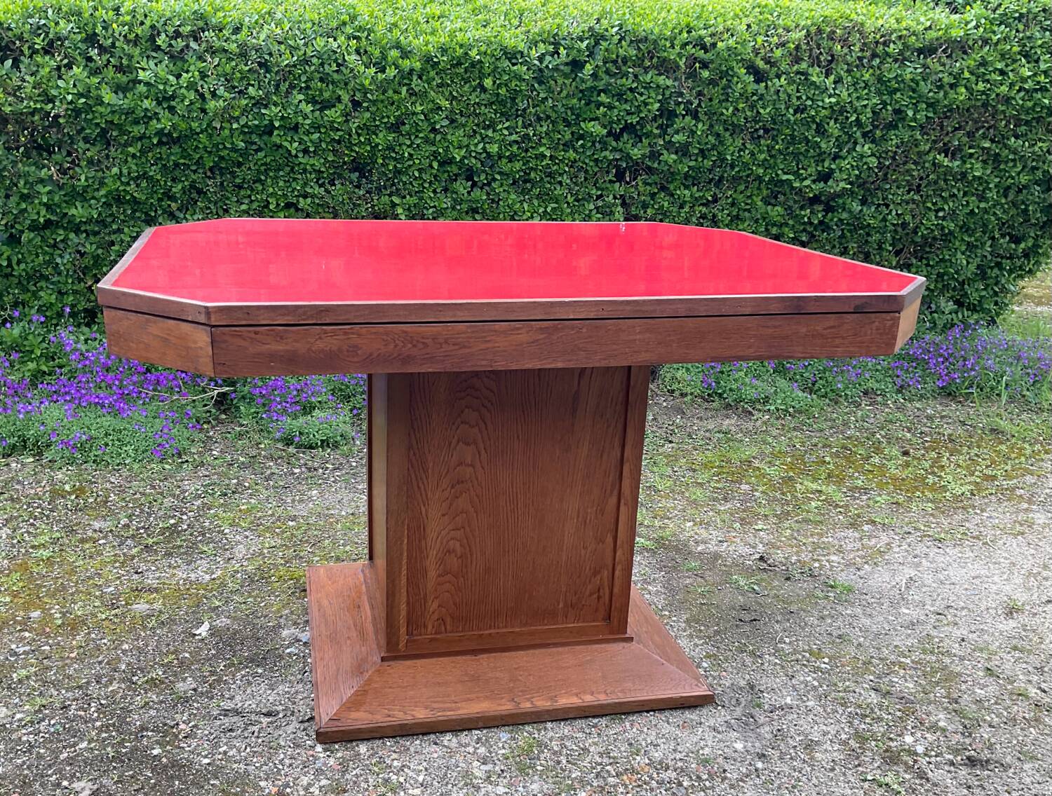 Art Deco dining table in wood and red Formica