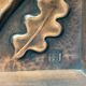 Art Deco bas-relief in Maredsous brasswork.