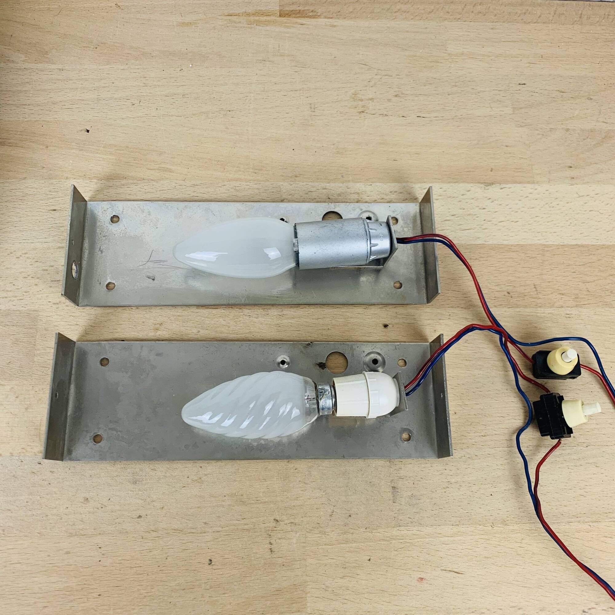 Pair of molded glass and metal wall lights from the 1950s