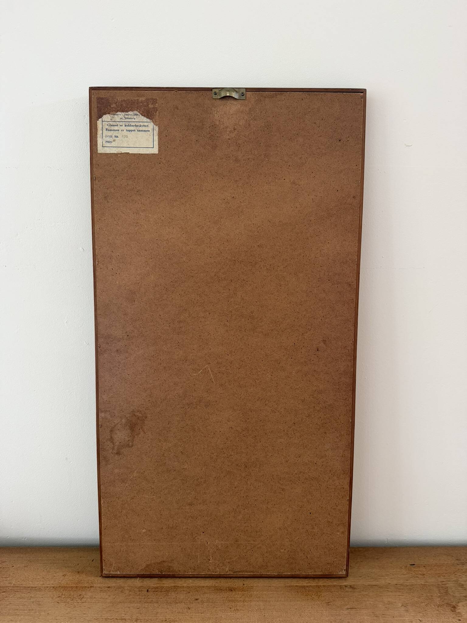 Beautiful vintage Danish teak mirror with mittered edges and nice brass det