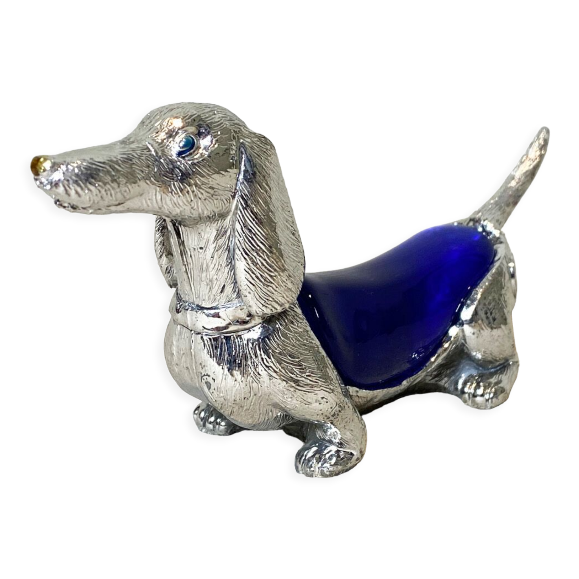 Teckel en métal et résine. 13*7 cm. Très bon état