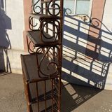Shelf on volute wicker legs