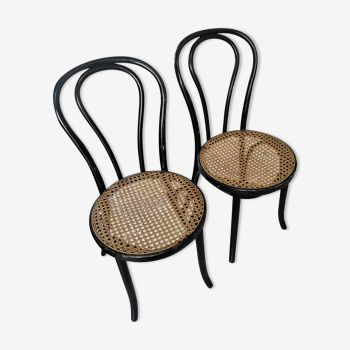 2 Black bistro chairs and wicker
