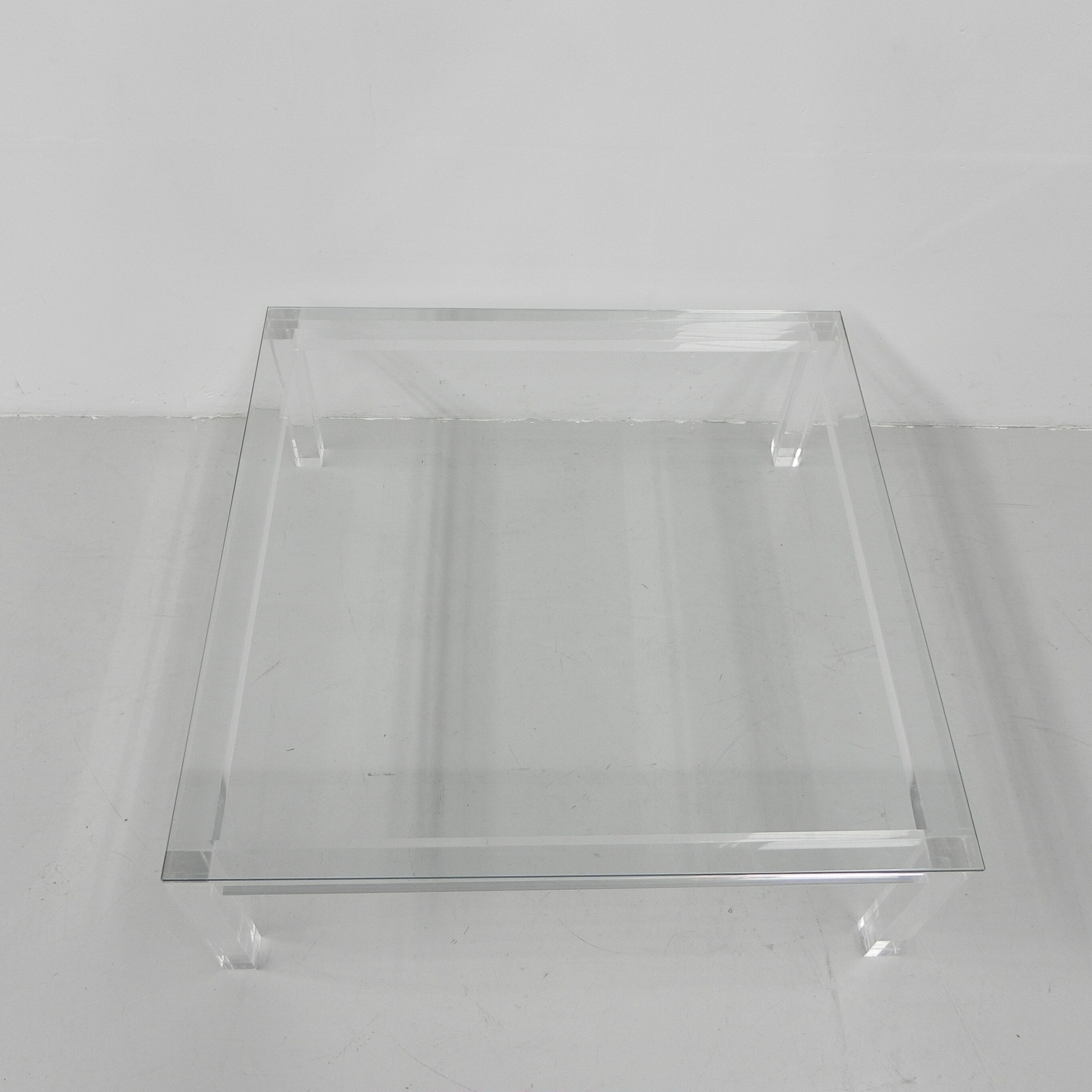 Vintage coffee table on perspex legs