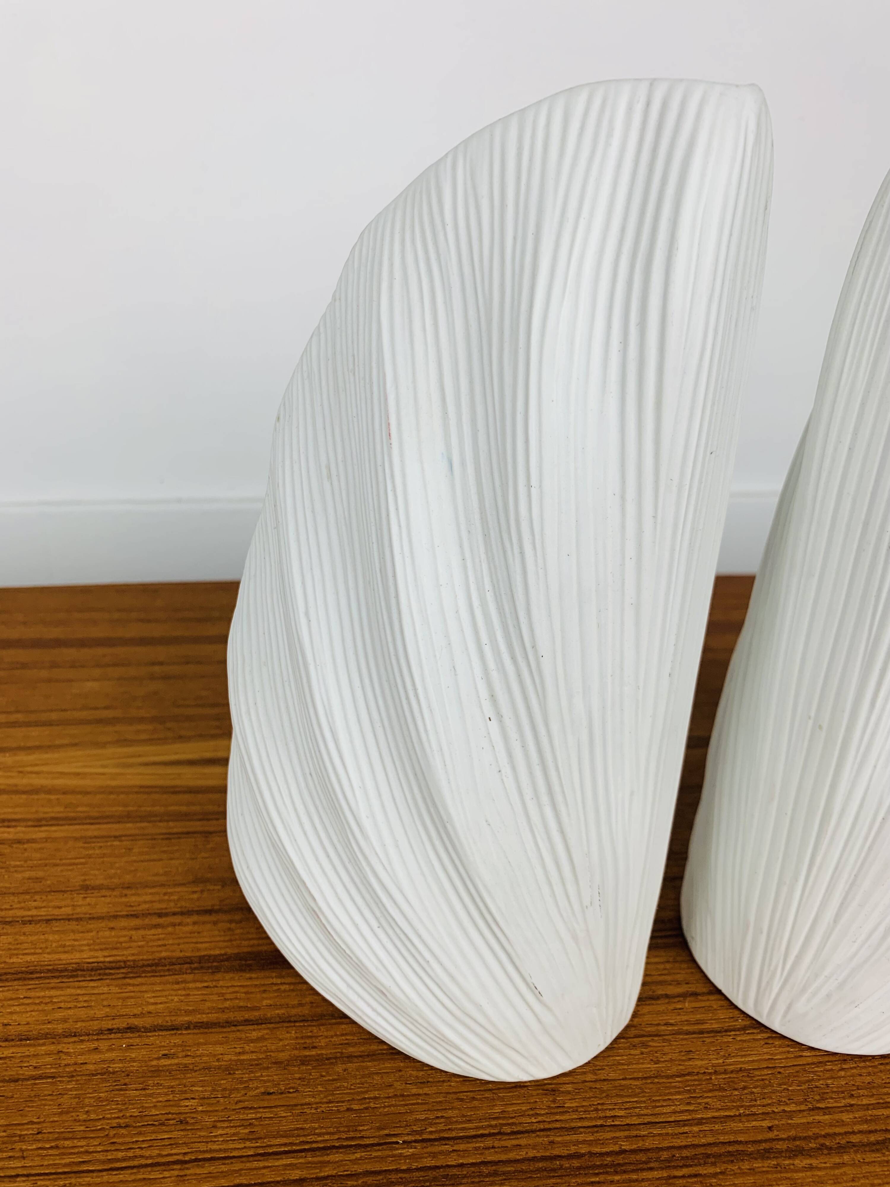 Pair of white ceramic coral vases, bookends